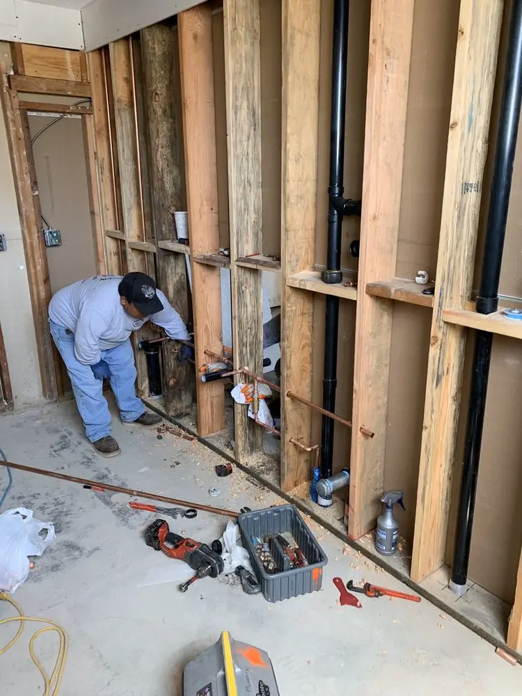 Commercial rough-in plumbing for Water Heater Replacement in Parish Center
